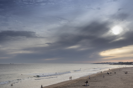 Sunset on surfers beach in carcavelos, portugalの写真素材