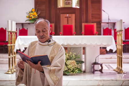 AMADORA/PORTUGAL - 29 AUG/15 - Father  in the local churchのeditorial素材