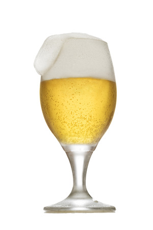 Glass of beer with foamの写真素材