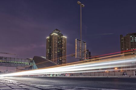 Light track of cars in a long exposure of dubai city. Internet cityの写真素材
