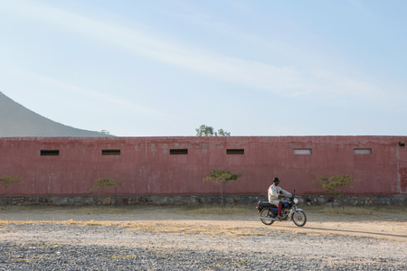 African man riding a motorcycleの写真素材
