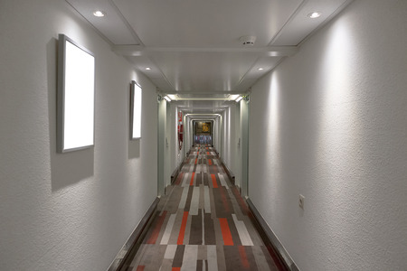 Hotel corridor with carpeted colorの写真素材