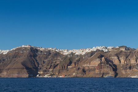 Panoramica of fira, santorini view of the sea with cruises.の写真素材