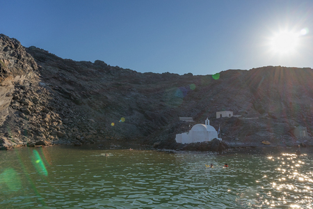 volcano in santorini, with churchの写真素材