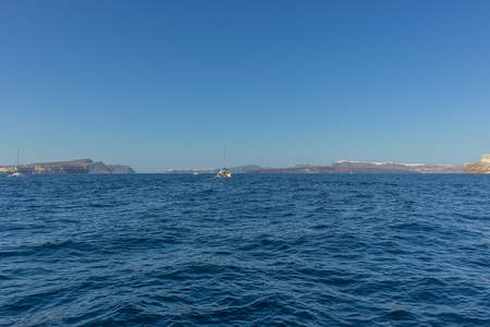 boats to sail in the caldera santoriniの写真素材