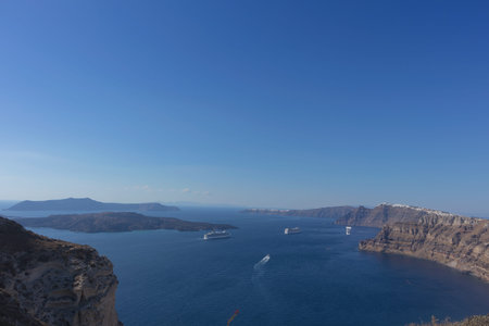 Beautiful view of Caldera with passenger cruises. Santorini, Greece.の写真素材