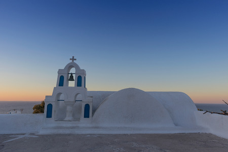 Church in oia, Santorini. Sunset. Greece.の写真素材