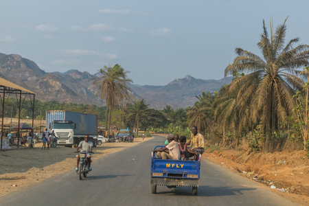 SUMBE/ANGOLA 10 OCT 2017 African family to travel by motorcycle. Angola.のeditorial素材