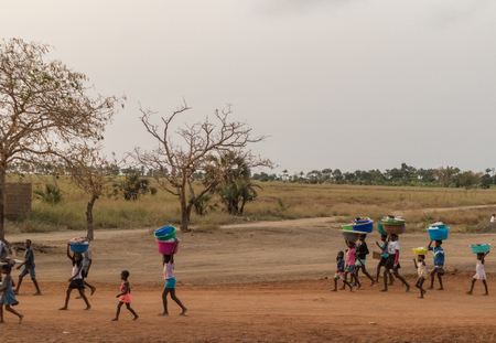 SUMBE/ANGOLA 10 OCT 2017 - African community to return home after a day's work. Angola. Sumbe.のeditorial素材