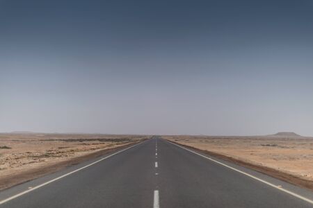 Road without cars in the Namibe Desert. Angola.の写真素材