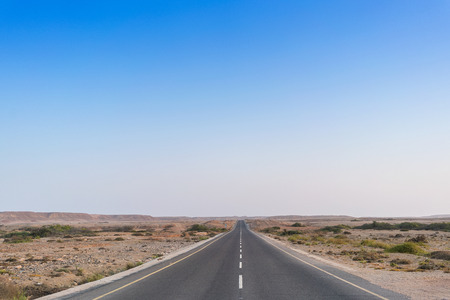 Road without cars in the Namibe Desert. Angola.の写真素材