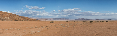 Landscape with rocky mountains in the Namibian desert. Sesriem, Sossusvlei.の写真素材