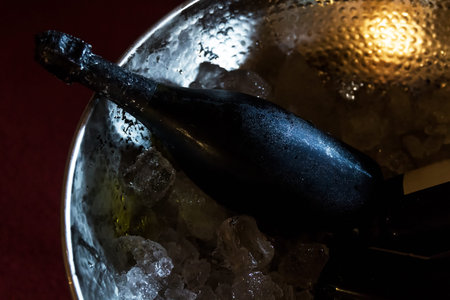 bottle of luxury champagne in frape with ice.の写真素材