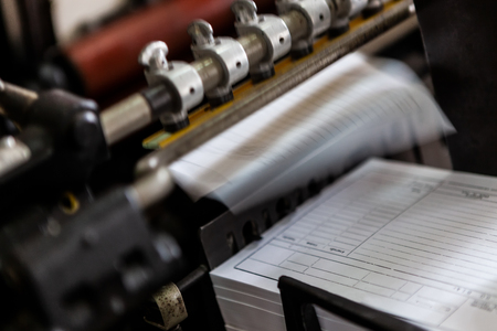 Old printing machine workingの写真素材