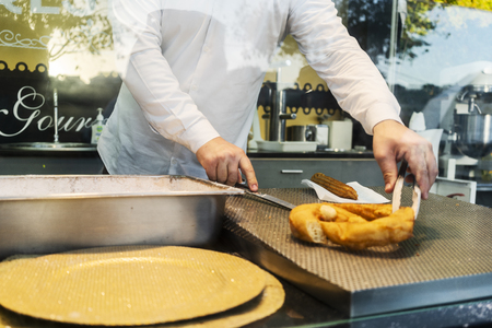 Man to cook Portuguese delicacy knew by farturas.の写真素材