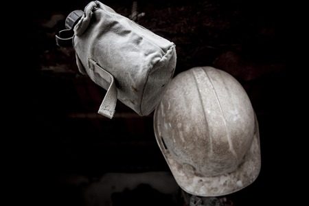 Old and dusty military equipment. helmet and canteen.の写真素材