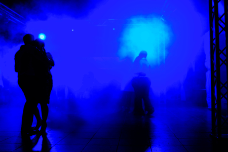 Couple dancing at the disco.の写真素材