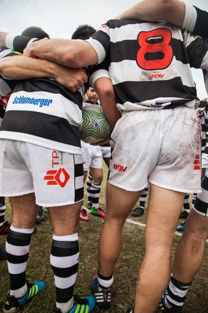 POINTNOIRE/CONGO - 18MAY2013 - Team of amateur friends playing rugbyのeditorial素材