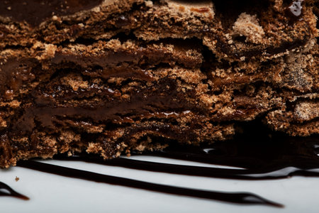 Slice of creamy chocolate cake in detail.の写真素材