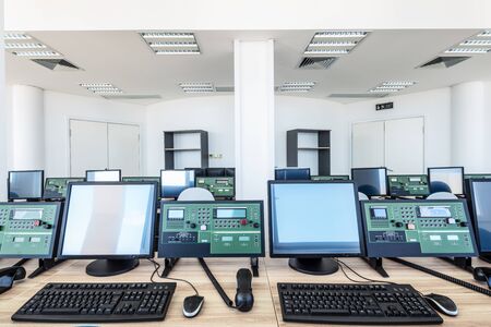 Control room with machines and computers.の写真素材