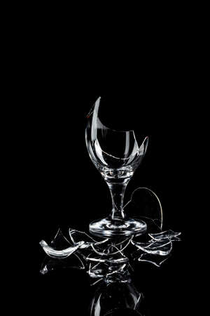 Abstract photograph of broken glass with black background.の写真素材