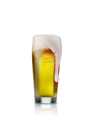 Beer glass isolated on white background with foam.の写真素材