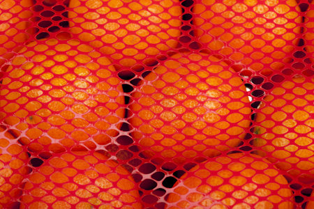 Fresh mandarin citrus fruits on a market stand 