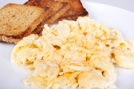 Breakfast - roasted toasts, eggs, bacon の写真素材