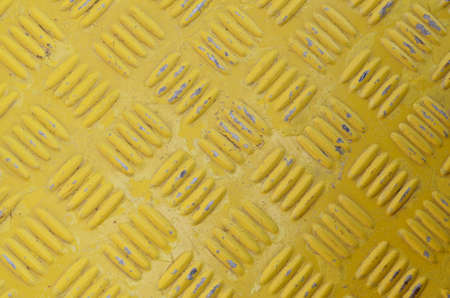 yellow metal pattern backgroundの写真素材