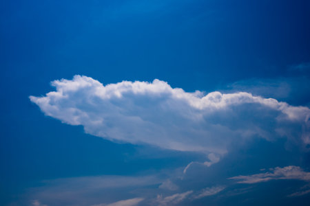 White clouds over the blue skyの写真素材