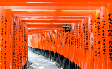 Red Tori Gate at Fushimi Inari Shrine in Kyoto, Japan, selective focus, soft focus and blur imageのeditorial素材