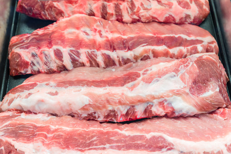 Raw pork loin backrib great for BBQ and foodの写真素材
