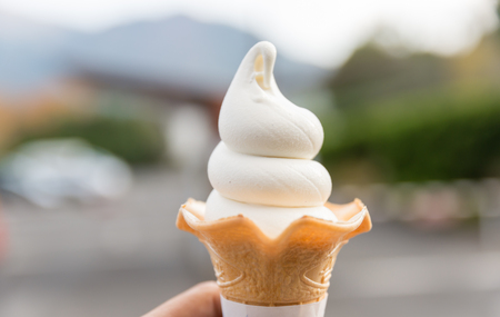 Melting Vanilla Soft Serve Cream, Selective Focus, Blur Background.の写真素材
