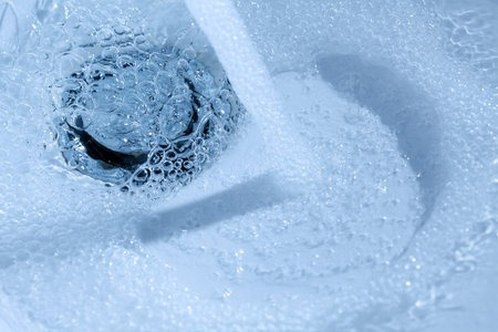 Water running down in drain