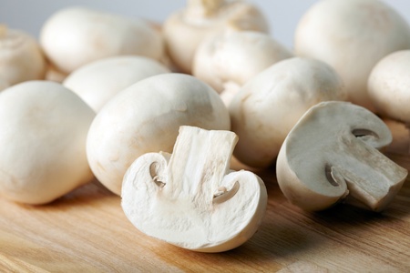 Champignon on wooden backgroundの写真素材