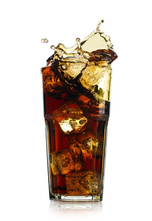 Splashing cola in glass  Isolated on white backgroundの写真素材