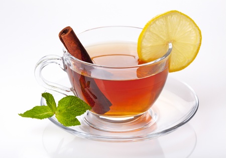 Cup of tea with lemon, cinnamon and mintの写真素材