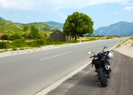 Modern motorbike on the road borderの写真素材