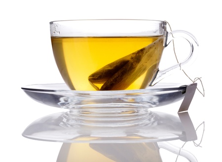 Cup of green tea isolated on whiteの写真素材