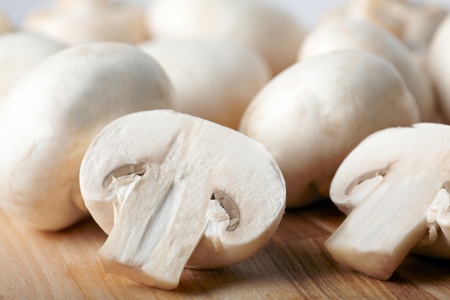 Champignon on wooden backgroundの写真素材