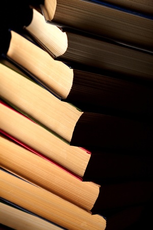 Pile of books on a black backgroundの写真素材