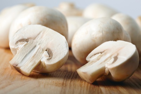 Champignon on wooden backgroundの写真素材