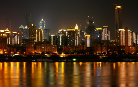 Skyscrapers reflecting in the riverの写真素材