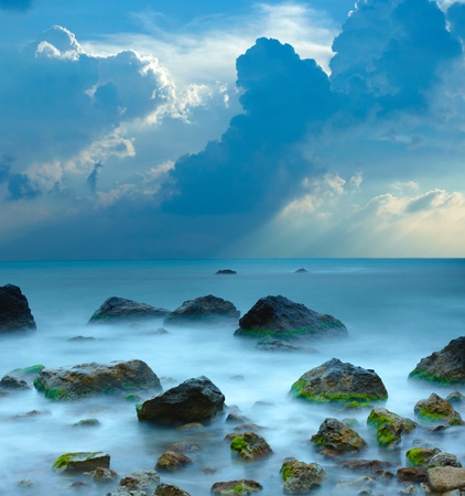 Sea stones at sunsetの写真素材