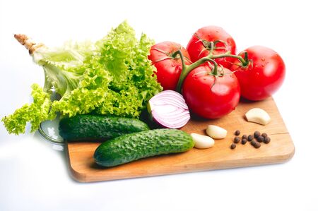 Fresh vegetables on wooden hardboardの写真素材