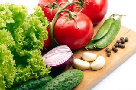 Fresh vegetables on wooden hardboardの写真素材