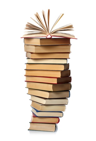 Pile of books isolated on white background の写真素材