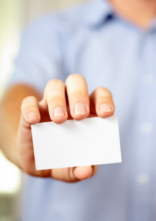 Man holding visiting cardの写真素材