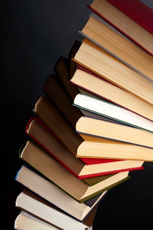 Pile of books on a black backgroundの写真素材