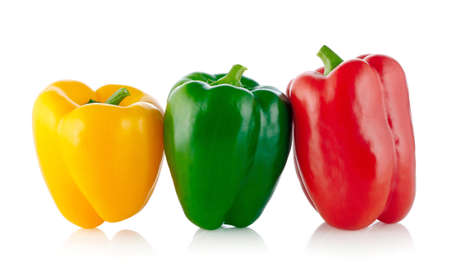 Three colors Paprika isolated on whiteの写真素材